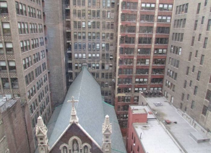 Un limpiador de ventanas valiente en Manhattan. ¿O un loco temerario? 1 Un limpiador de ventanas valiente en Manhattan. ¿O un loco temerario? 2